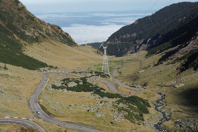 Brasov Private Tour: Transfagarasan road & Poienari Fortress - Vidraru Dam: Big Engineering in a Tight Mountain Setting