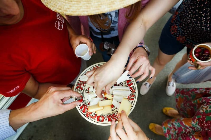 Bucharest: Hidden Markets Walking Tour with Tastings - Obor Market: the real tasting start with tuica and a peasant platter