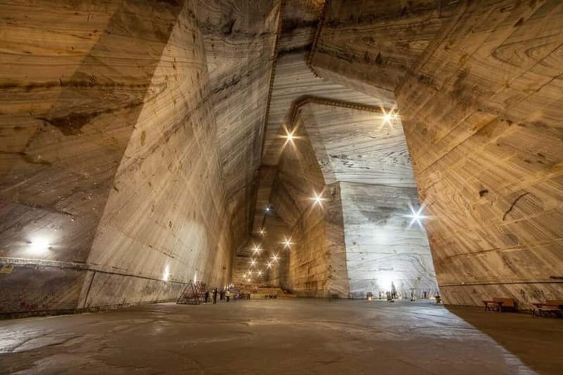 Bucharest: Muddy Volcanoes and Salt Mine Private Day Tour - Unirea Salt Mine: 12 C Caverns With a Medical Past and Practical Value