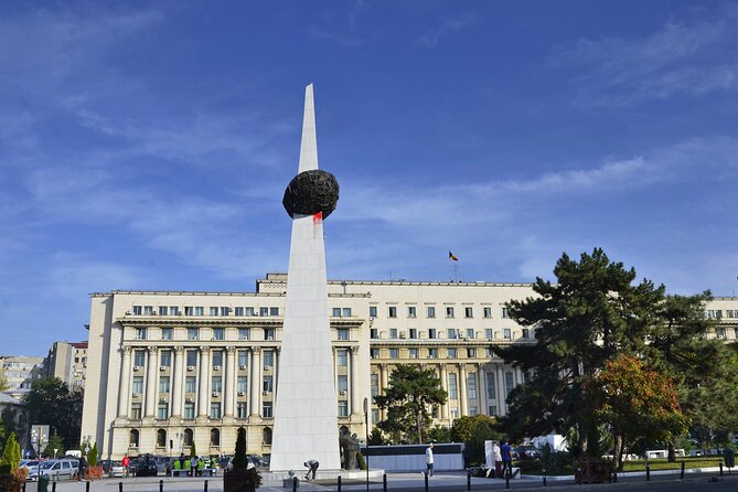 Bucharest one day tour with Parliament Palace and Village Museum - Panoramic Bucharest stops: Athenaeum, Cantacuzino, and art in former royal space