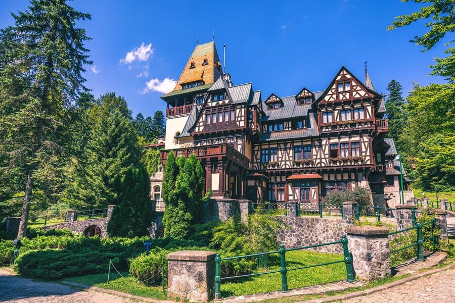Bucharest: Peles Castle, Bran Castle, & Brasov Full-Day Tour - Getting out of Bucharest: pickups, coach comfort, and mountain time