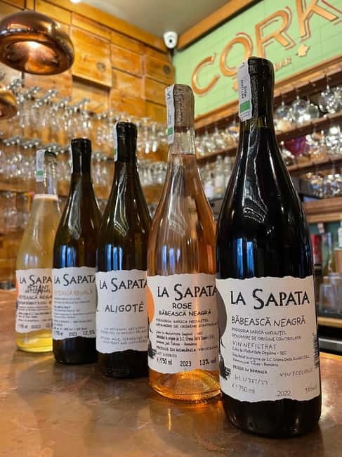 Bucharest: Romanian Wine Tasting Experience at Corks - Snacking, pacing, and the cozy Corks atmosphere