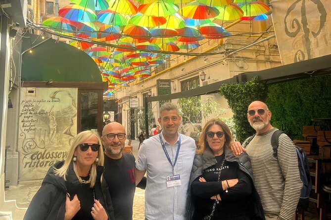 Bucharest Walking Tour with a Native Italian Speaking Guide - Calea Victoriei and the umbrella street photo moment