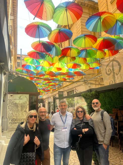 Bucharest: Walking tour with Italian speaking guide for small groups - Old Town walking: Lipscani energy, monastic calm, and Manuc’s Inn vibes