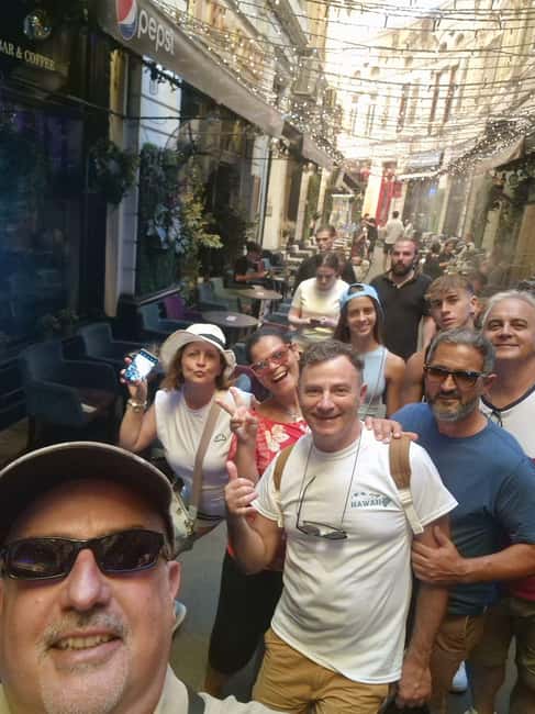 Bucharest: Walking tour with Italian speaking guide for small groups - Cărturești Carusel, Pasajul Villacrosse, and the photo-stop rhythm