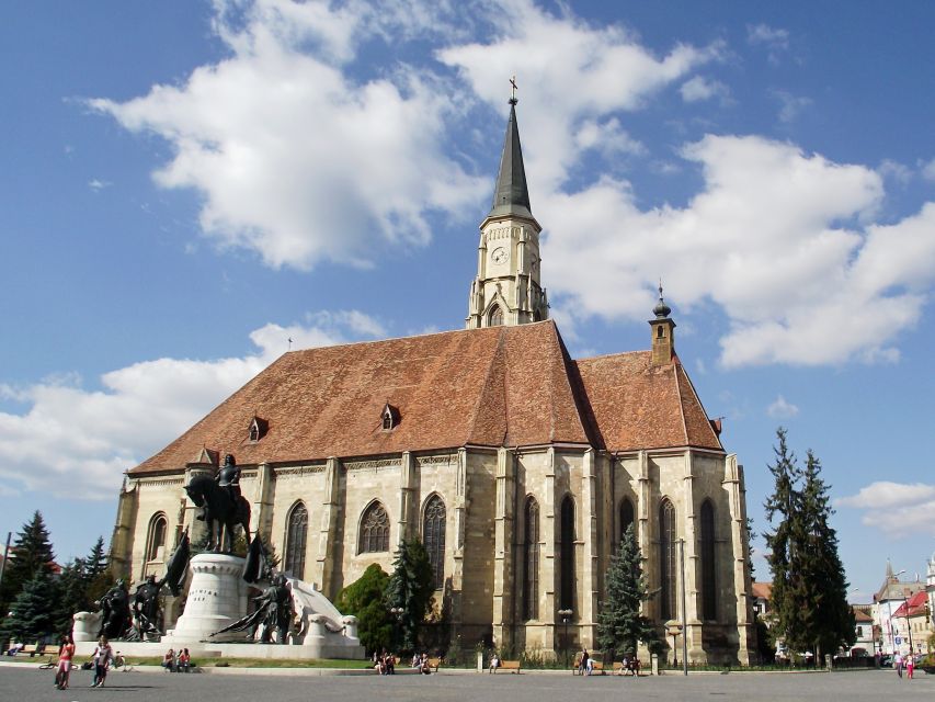 Cluj: Private City Walking Tour - Union Square and the Matthia Corvin statue: the medieval storyline you can walk through