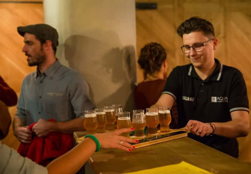 Explore Bucharest: Beer & History Tour - Romanian Athenaeum and Revolution Square, where the stories have weight