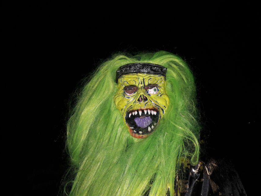 From Brasov: Halloween Party at Bran Castle - Entering Bran Castle at night, with guided Dracula-style storytelling