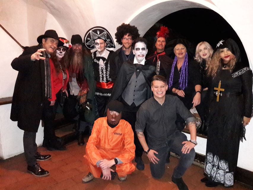 From Brasov: Halloween Party at Bran Castle - Village welcome: red wine, palinca, and snacks before the castle