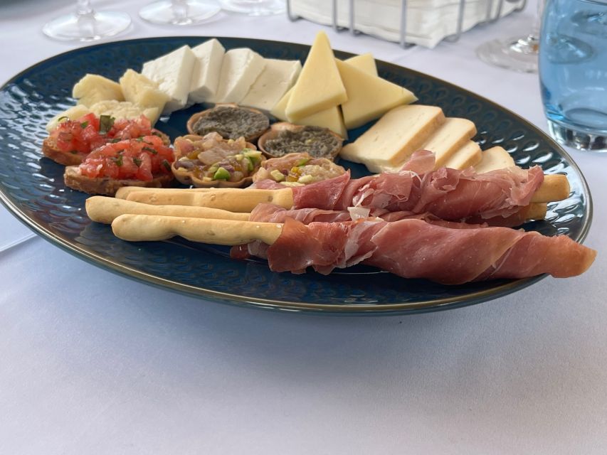 Peles & Cantacuzino Castles: Gourmet Wine & Cultural trip - Terrace wine tasting: 3 Romanian wines, cheese pairings, and the best setting