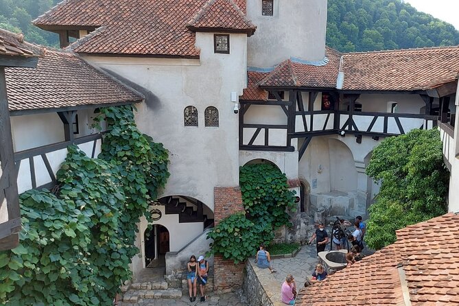 Peles Castle, Dracula Castle and Brasov old town - private tour from Bucharest - The Bucharest to the Carpathians start: pickup at 7:30am