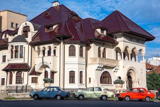 Private: RedPatrol Bucharest Contrasts Tour in a Vintage Car - Stop 1 to Stop 3: Academia Română and the royal edge (where demolition and beauty collide)