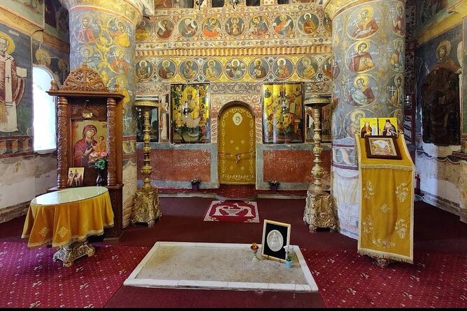 The Real Dracula's Castle in Targoviste, Winery and Dracula' Tomb - Snagov Monastery on the lake: the Dracula tomb stop with a quiet tone