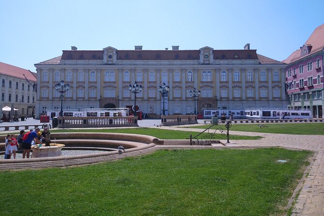 Timisoara Downtown Dream Tour - Stop 1 at Piata Victoriei: secession palaces and big civic landmarks